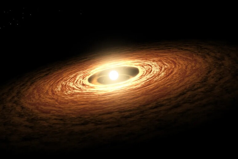 Rappresentazione artistica di un disco di gas e polveri che circonda una giovane stella (fonte: NASA/JPL-Caltech) - RIPRODUZIONE RISERVATA
